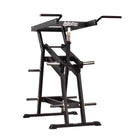 A black Viking Press gym machine with a high bar and adjustable seat, designed for overhead pressing strength exercises.