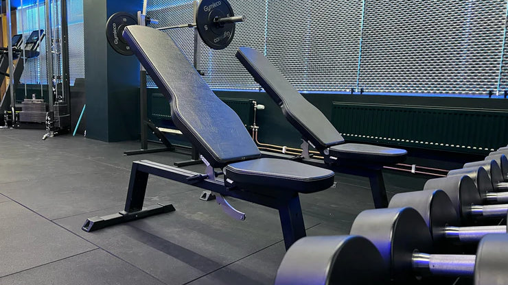 Gym bench with weights from Gymleco in a fitness center