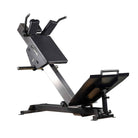 A black Hack Squat machine designed for leg workouts, featuring a stainless steel barbell and a padded support structure.