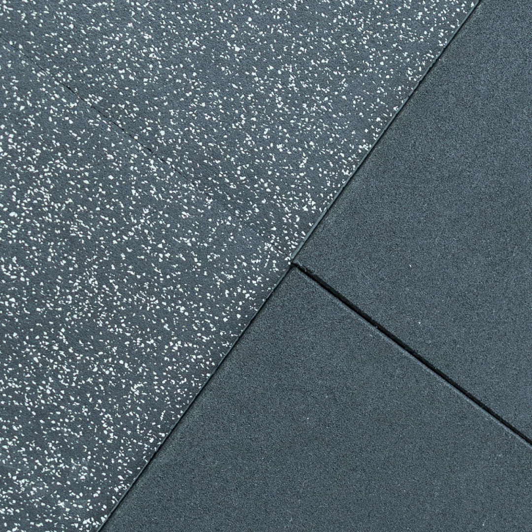 Close-up of two gray gym floor with different textures