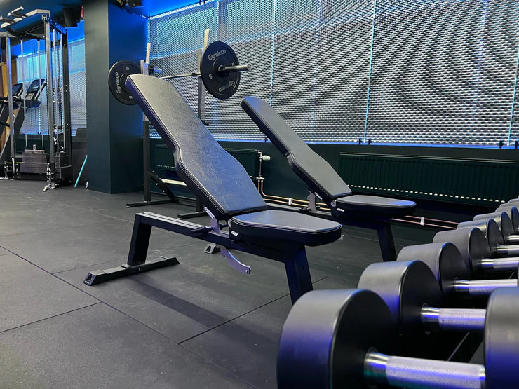 Gym bench with weights from Gymleco in a fitness center